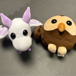 Adopt Me dragon and owl plush toys